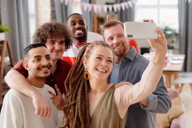 A group of friends taking a selfie together